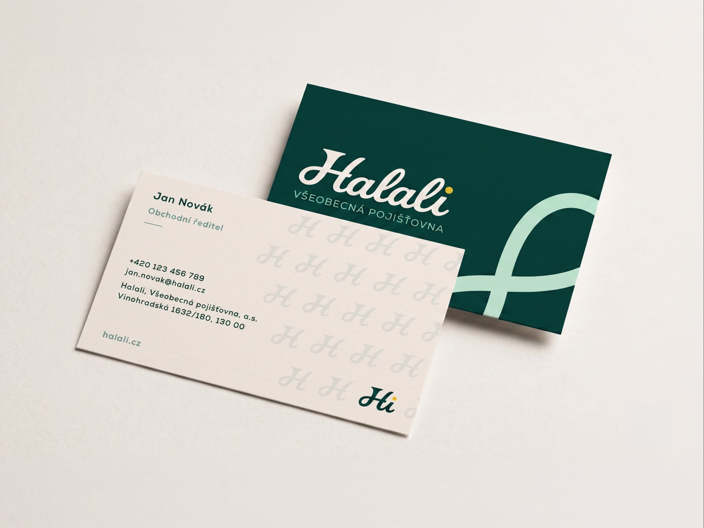 Halali business cards: the teal front with the logo and a mint loop, the champagne back with a tonal H pattern and the Hi monogram.